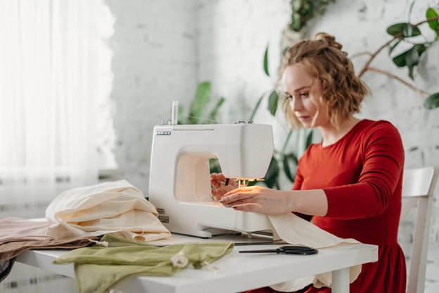 Young woman sewing